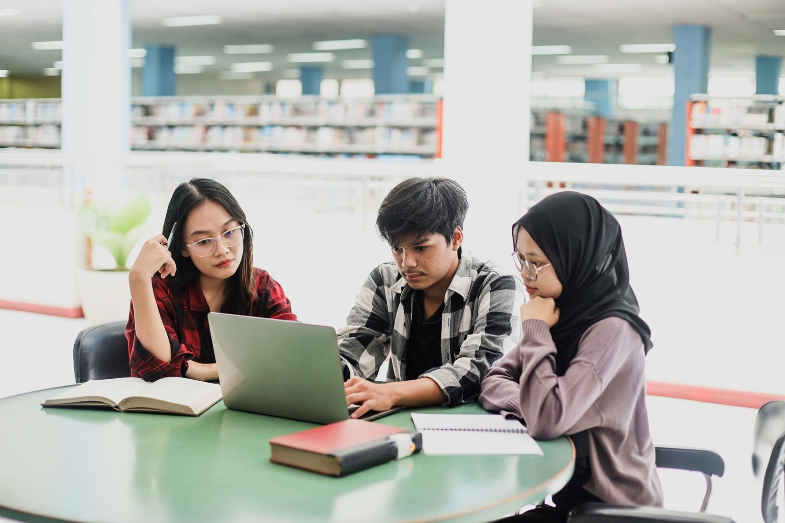 Students working together during a GED maths exam tuition session in Kuala Lumpur