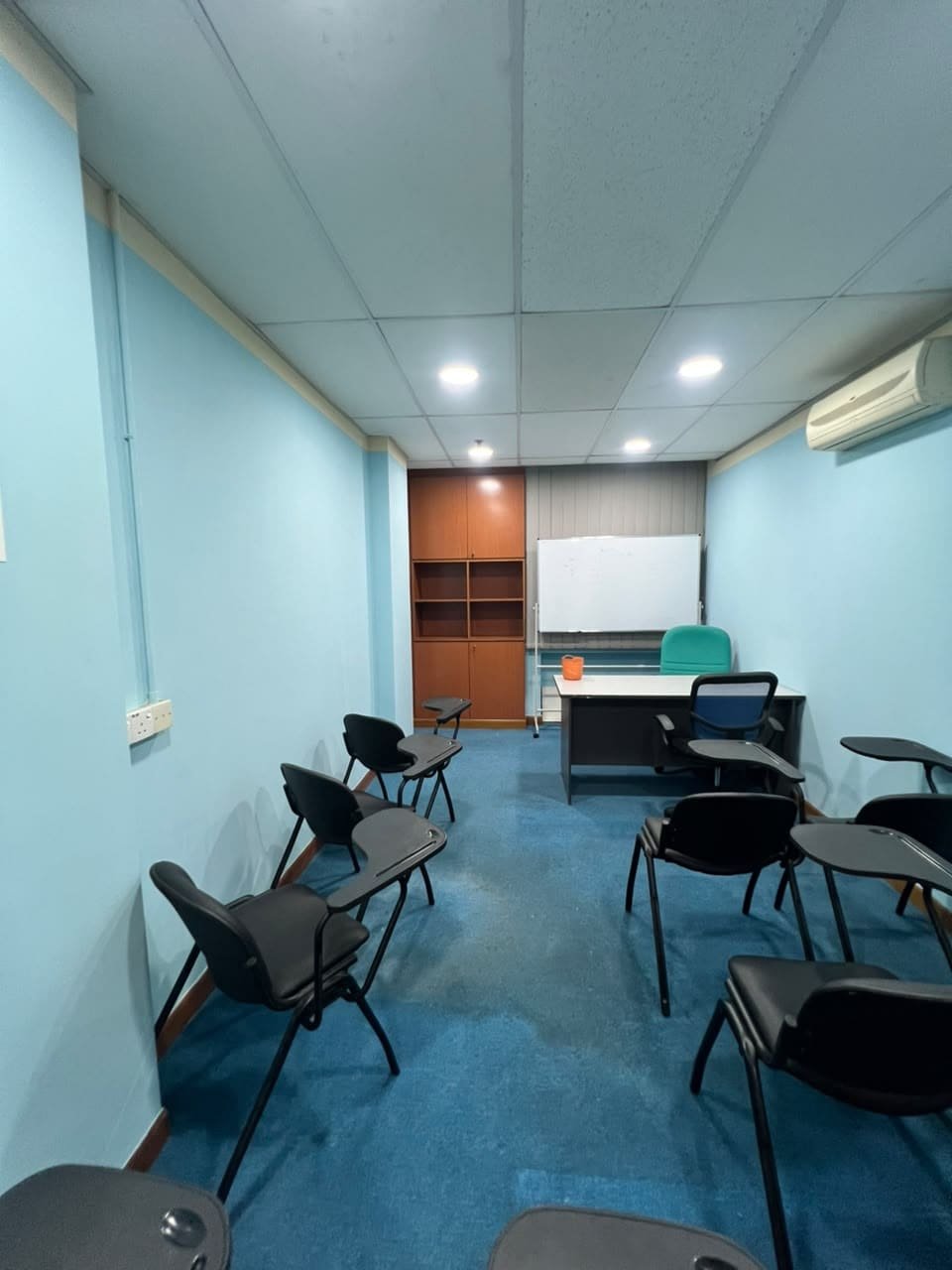 Students studying in a bright classroom