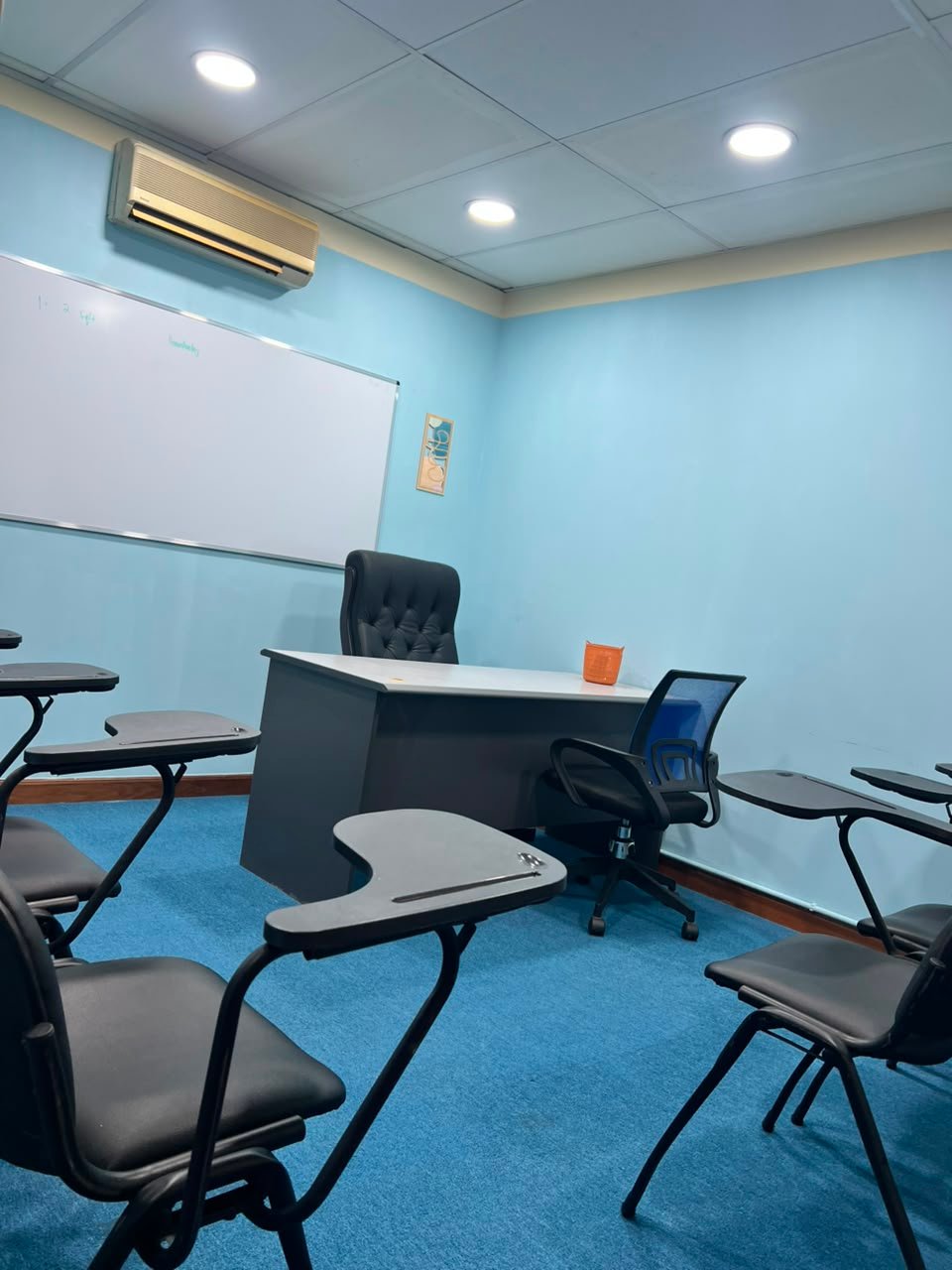Tutor teaching an IGCSE student one-to-one at BrainSpark Education, Plaza Mont Kiara, Kuala Lumpur